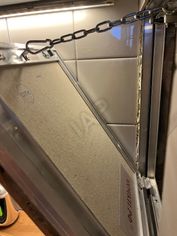 Hatch under tiles Hatch AlyuLait II
