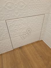 Hatch under tiles Hatch AlyuLait II